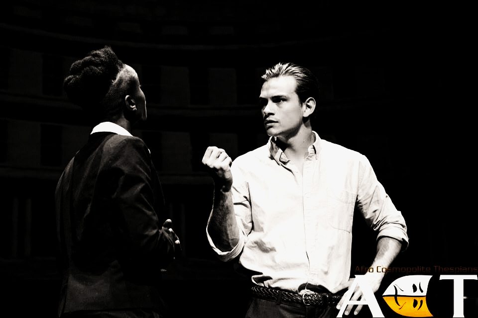 Production still — confrontation (black & white)