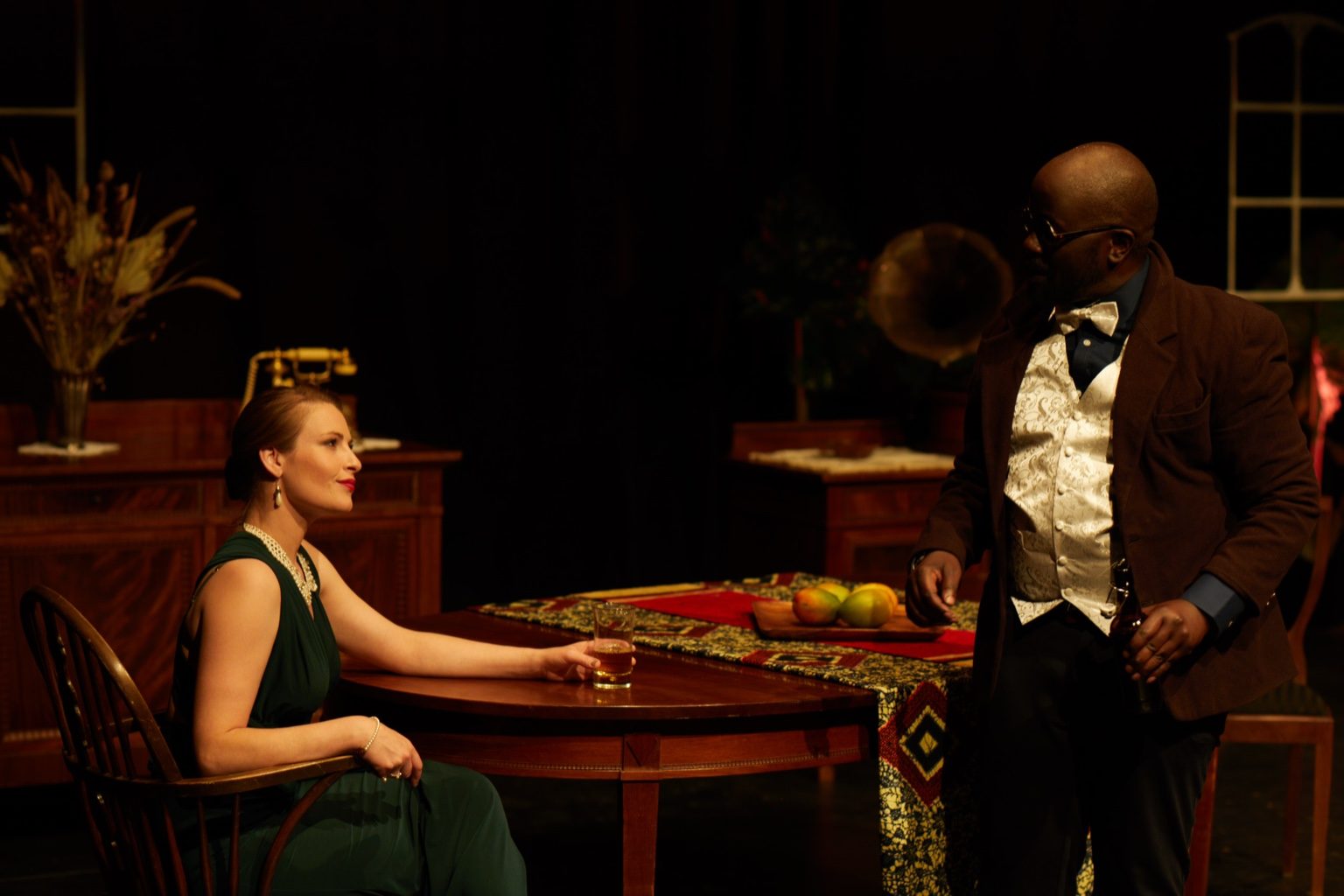 Production still — table dialogue