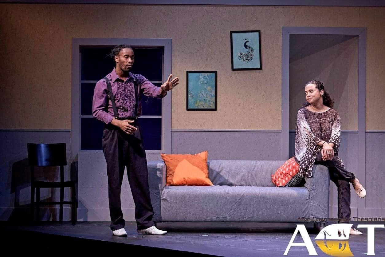 Production still — living room scene